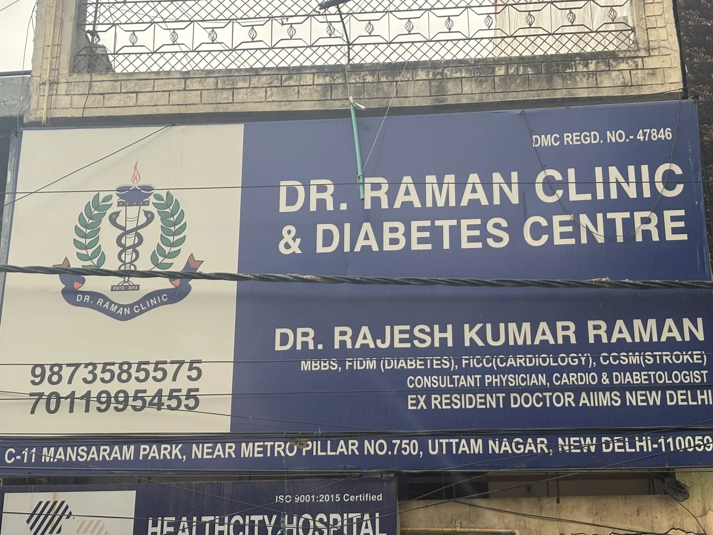 The Dr. Raman Clinic and Diabetes Centre signboard at Mansaram Park, Uttam Nagar